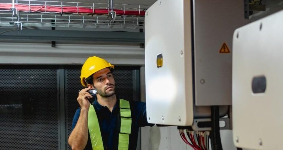 technician-inspects-electrical-box-with-flashlight-2026-01-08-07-49-48-utc (1)